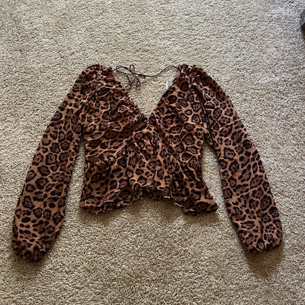 Cute cheetah print blouse with tie in back